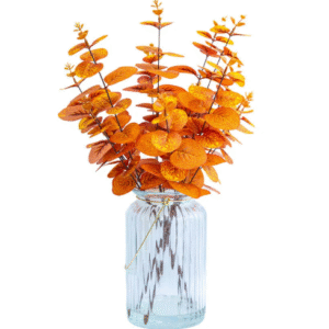 กิ่งต้นยูคาลิปตัสประดิษฐ์ในแจกัน สีส้ม